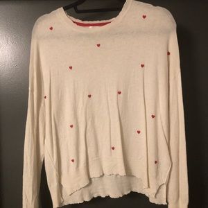 Light knit cream sweater with embellished hearts